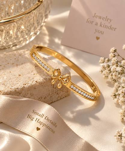 Gold-Tone Bow Bracelet with Sparkling Rhinestones