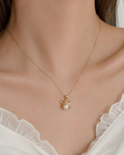 Golden Bow Pearl Pendant Necklace